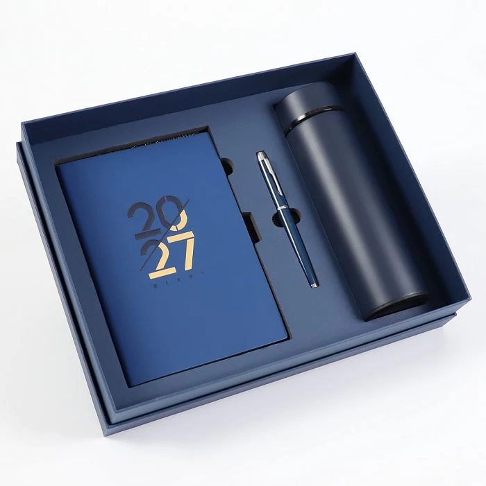 Diari personalitzat i bolígrafs